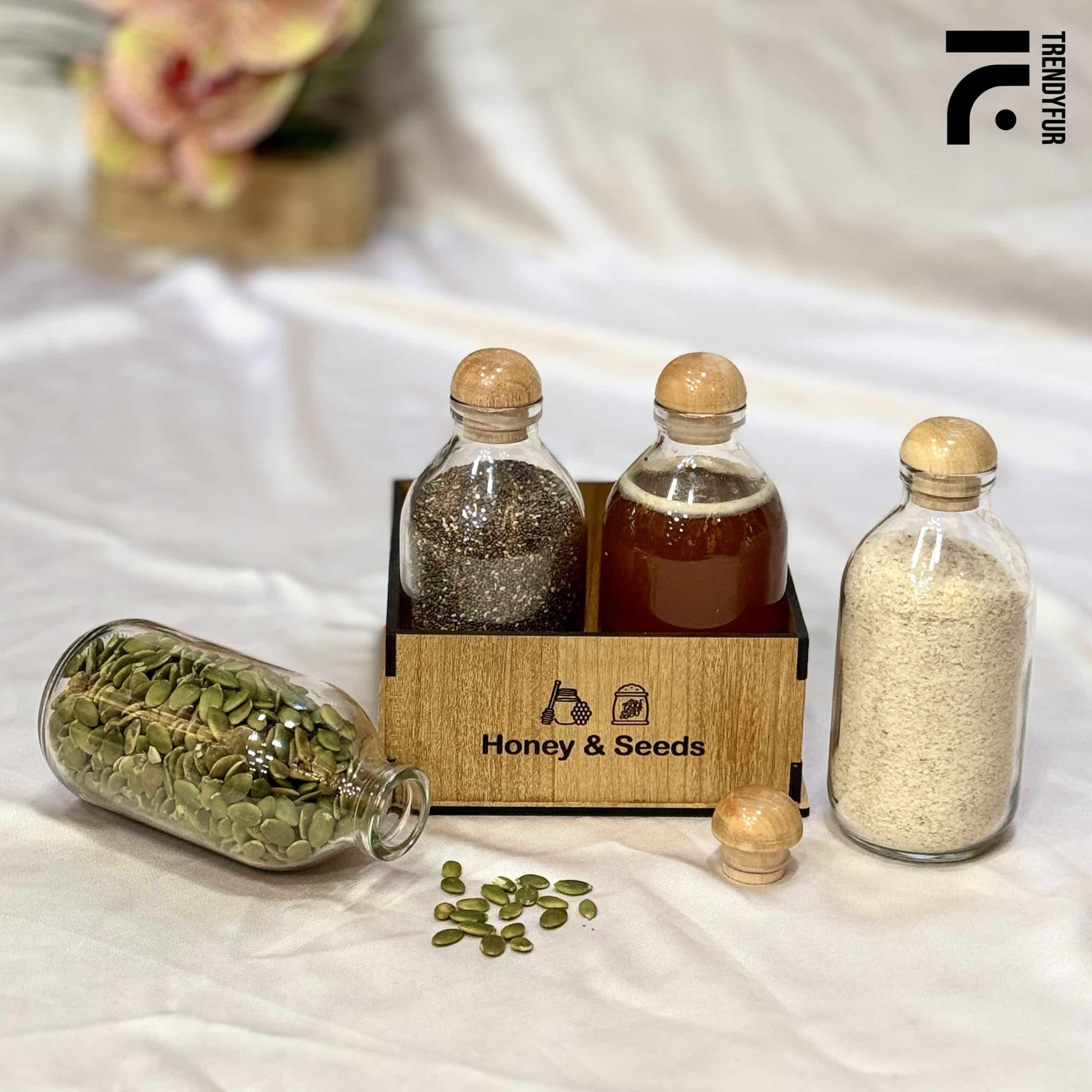 four-scaled-1.jpg Honey & Seeds Jar With Holder - Image 1